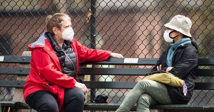 people wearing mask coughing”